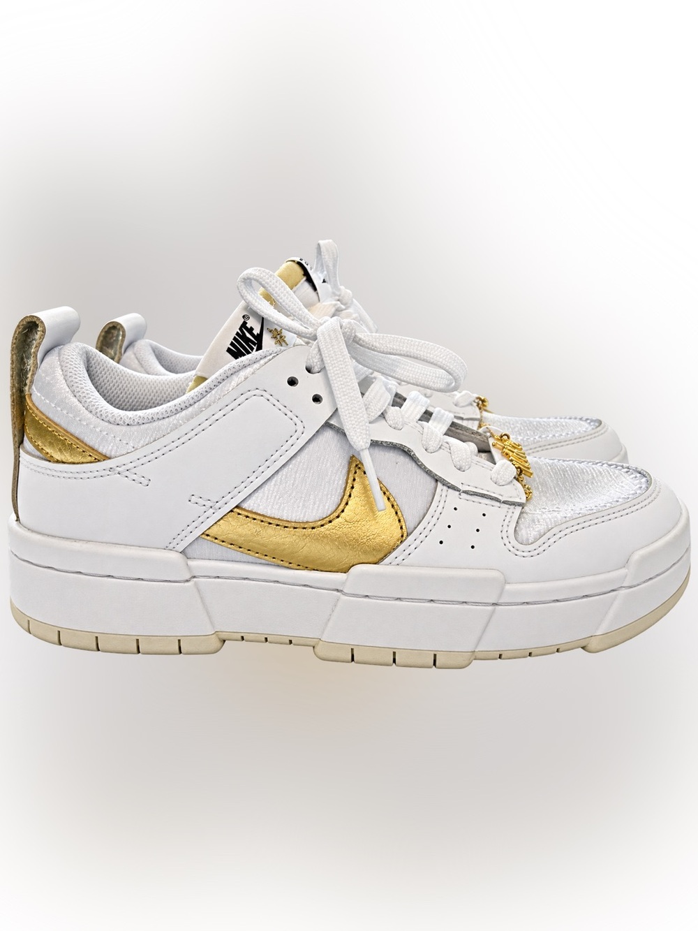 Nike Dunk Women’s White Sneakers with Metallic Gold Swoosh